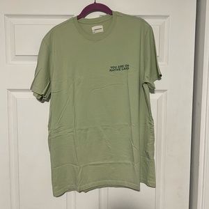 Urban Native Era/ REI You Are On Native Land medium tshirt